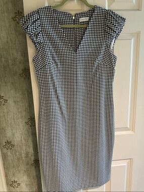 Trendy, black and white check CK dress
Never worn